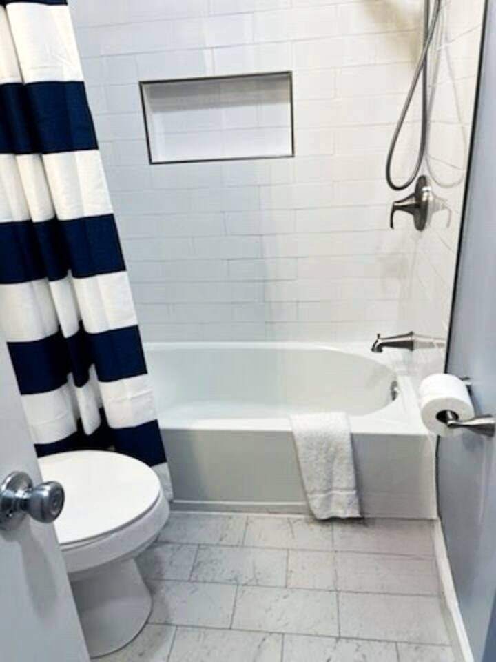 Tub and shower combination in the full bathroom