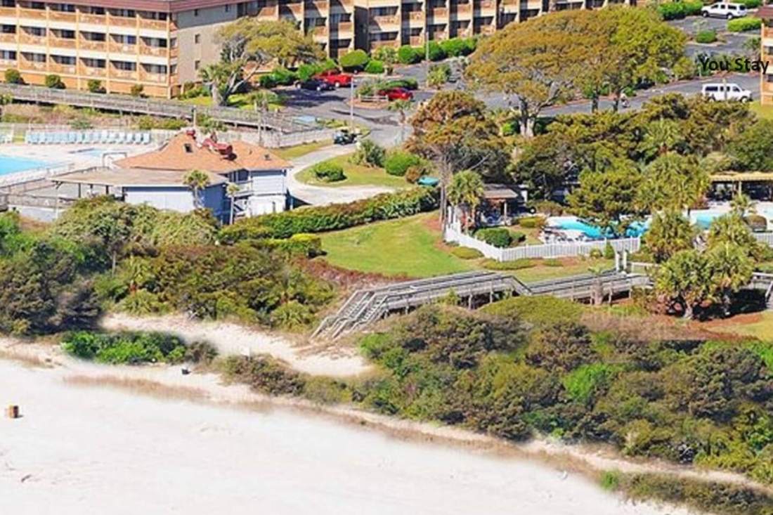 Aerial view of the resort, dunes and beach